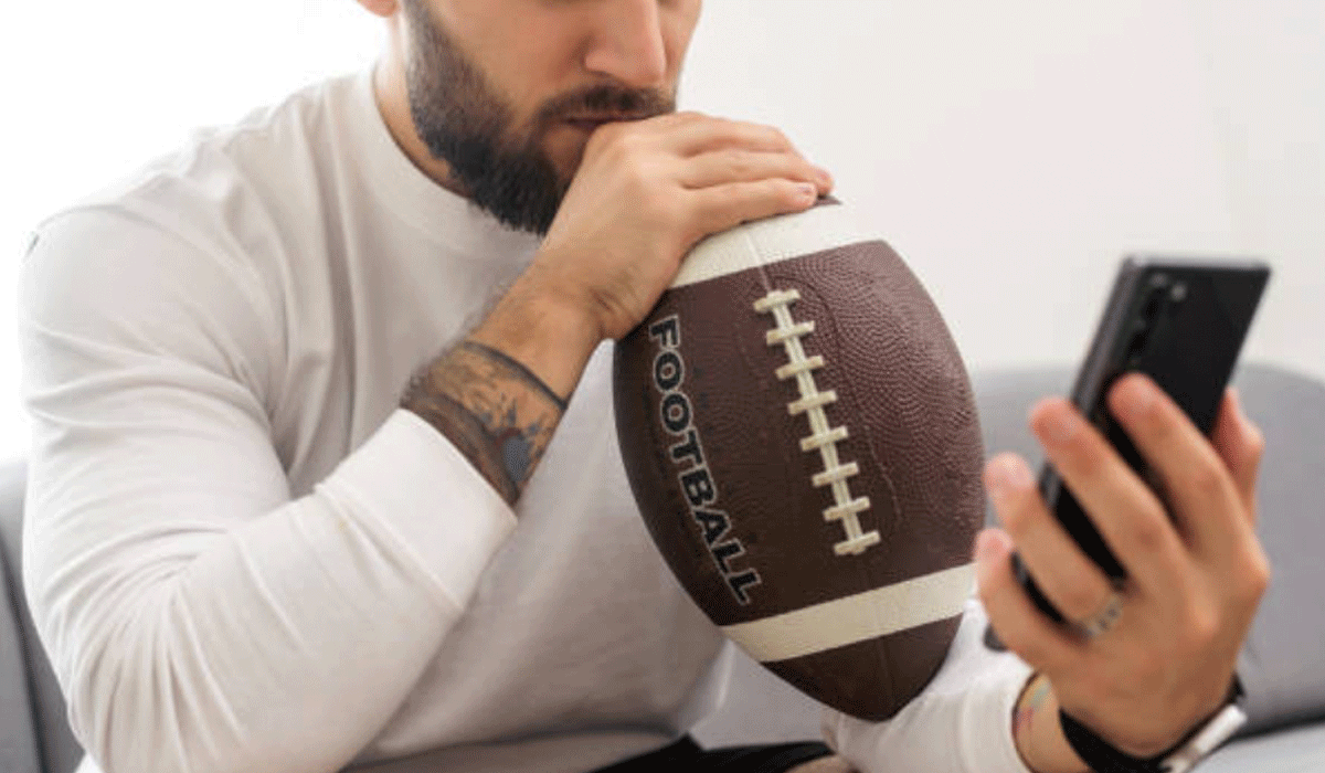 mcsweeneys.net - Aaron Hertzog - A Forty-Two-Year-Old Man Checks the Score of a High School Football Game